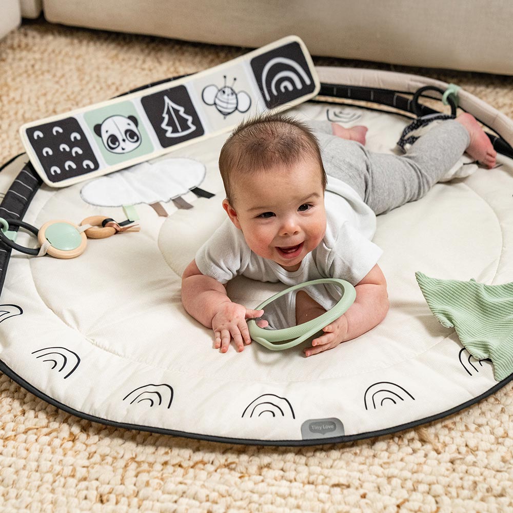 Active Gymnastics Tiny Love Developmental Gymini from the Black&White Décor series with a 90 cm diameter round mat, adjustable arches and a selection of 5 toys, 0m+