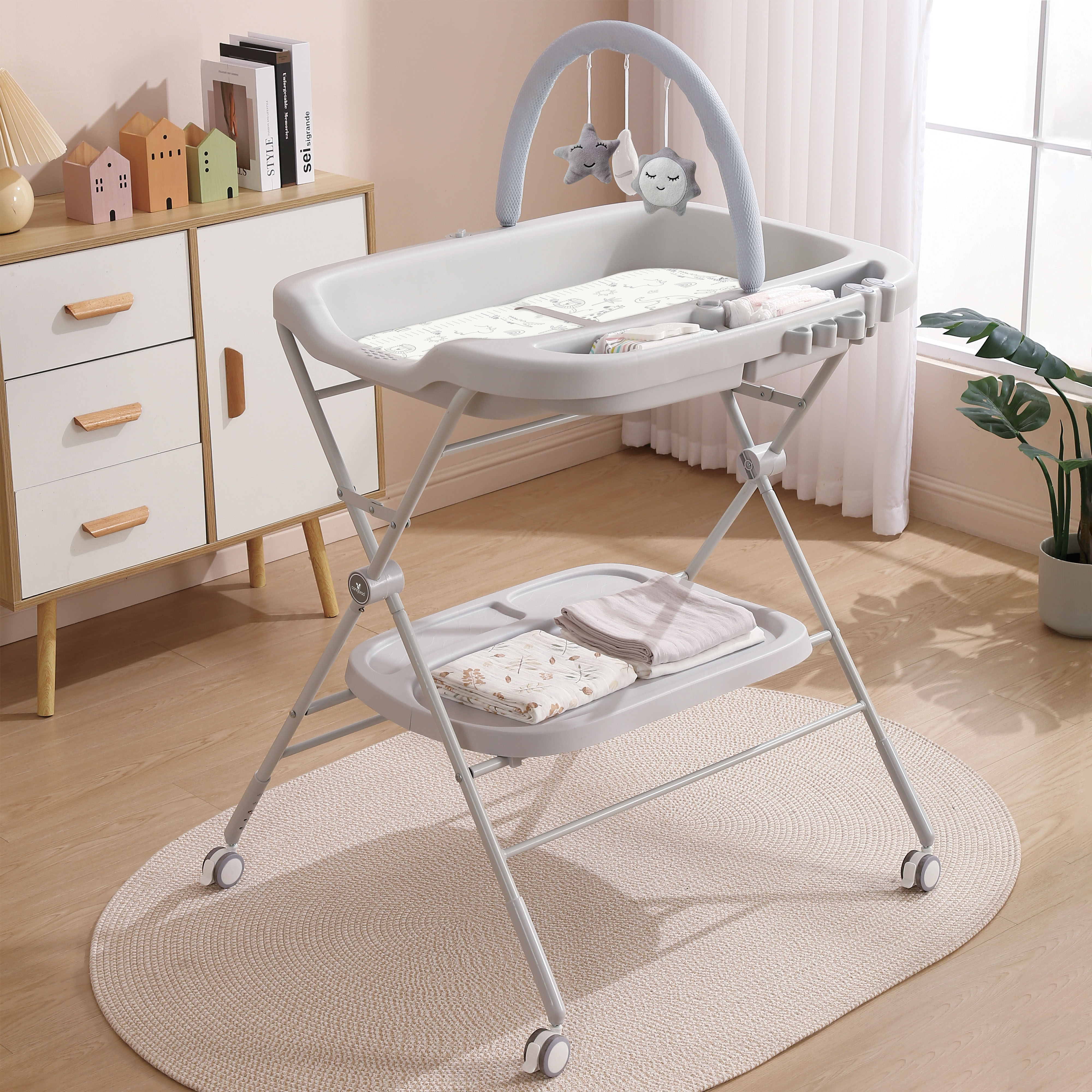 Multifunctional changing table Croco pink