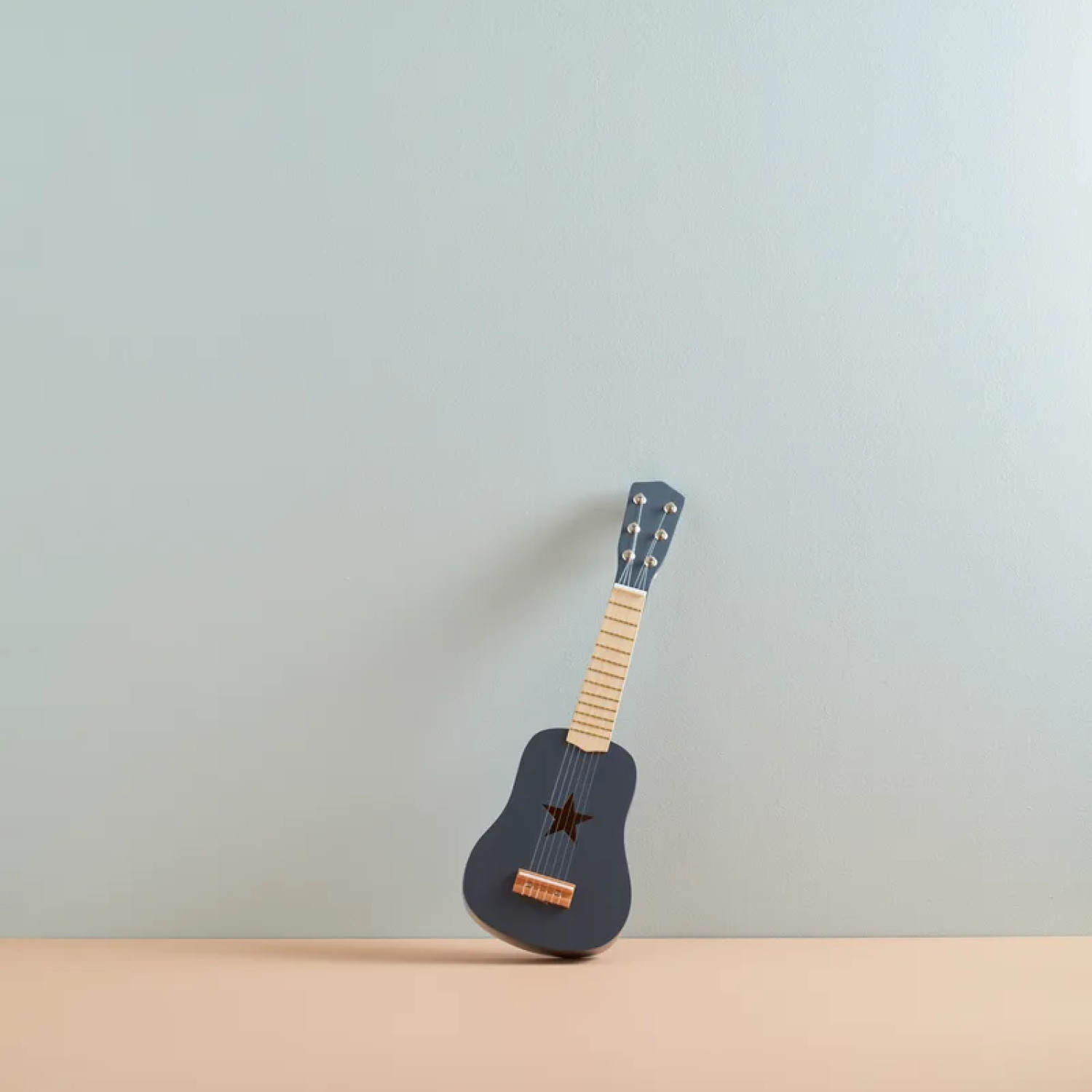 Wooden guitar for a little rock star Swedish Design Age: 3+ Size: 18x5x53.5 cm