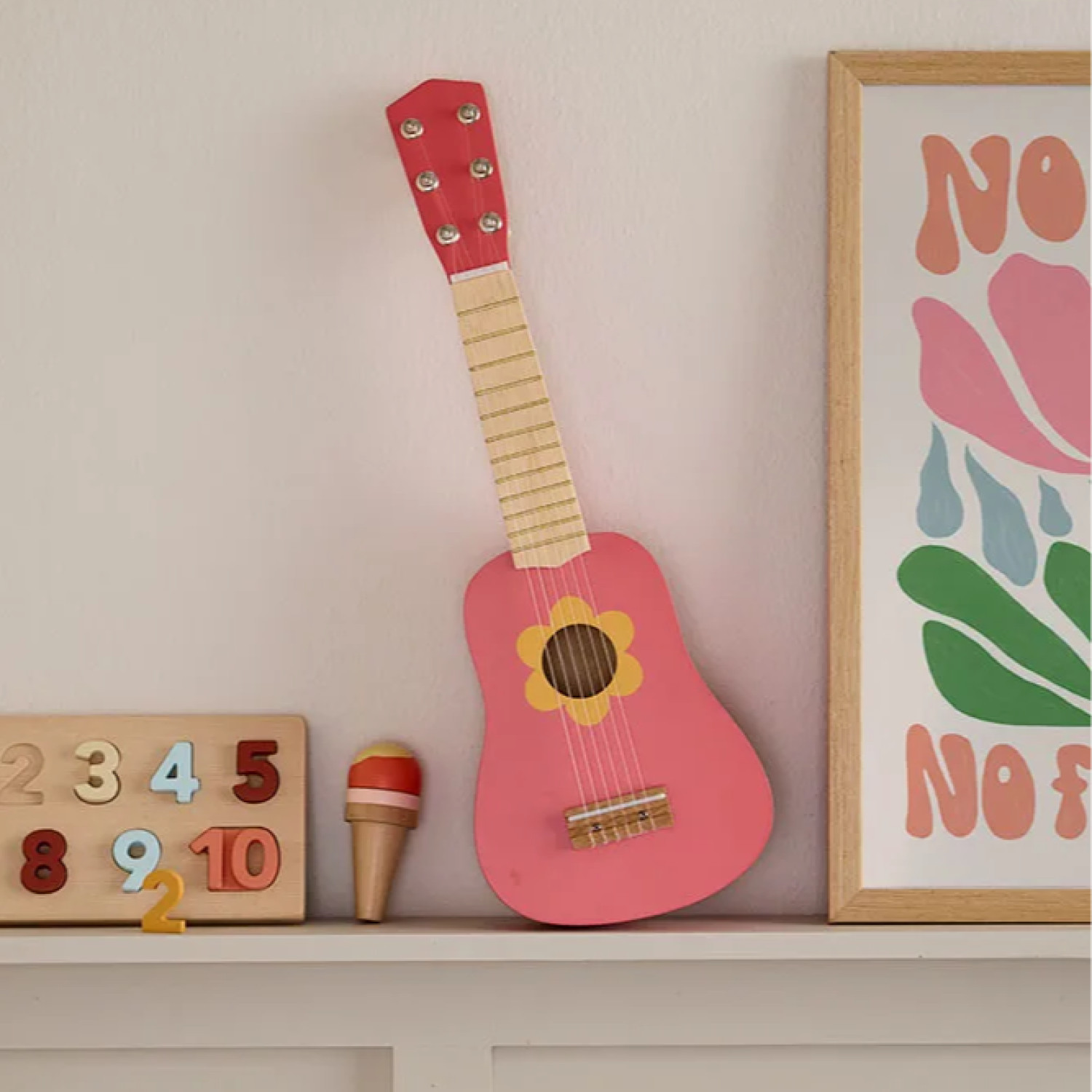 Wooden guitar for a little rock star Swedish Design Age: 3+ Size: 18x5x53.5 cm
