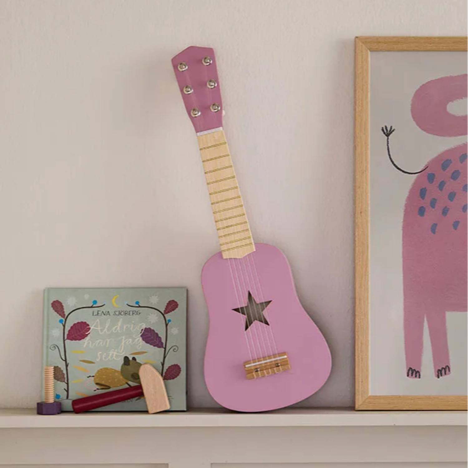 Wooden guitar for a little rock star Swedish Design Age: 3+ Size: 18x5x53.5 cm